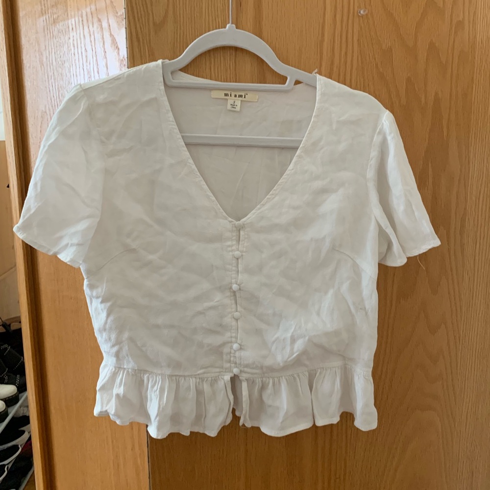Francesca’s white top